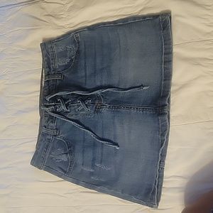 I & M Black Label  lace up front mini shirt.  High rise. Size medium.